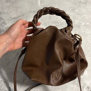 House of what brown leather crossbody bag